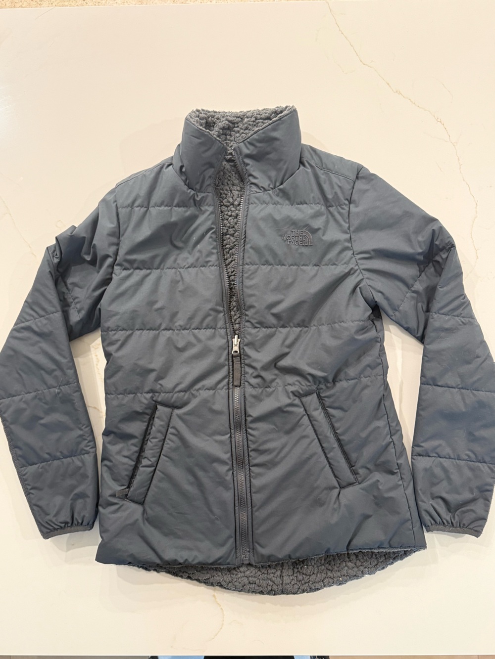 The North Face Quilted Jacket — gray